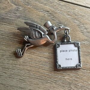 JJ stork brooch